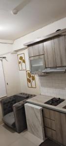 Green pramuka by Santoso Family