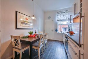 De Vischer un sin Fru