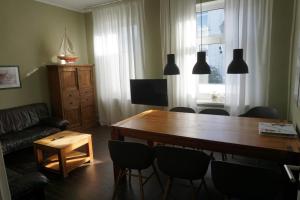 De Vischer un sin Fru