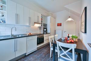 De Vischer un sin Fru