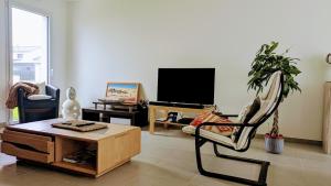 Maisons de vacances Maison neuve avec jardin : photos des chambres