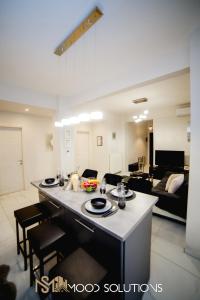 Camara ExpoBoutique Family MSLiving