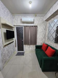 Green Pramuka by Santoso Family