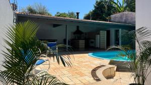 Casa Iguassu - Casa com churrasqueira e piscina em Foz do Iguaçu - Lazer para família e amigos