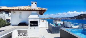 Marbella Suíte, vista mar, piscina e churrasqueira