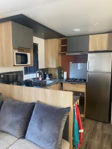 MH 007 ELITE 3 chambres dont suite parentale et 2 salles de bain sur magnifique parcelle dans camping 4 étoiles