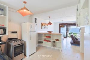 Casa 3Q Pé na Areia c churrasq. Bombinhas SDN042