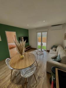 Appartements Maison a l Ecurie : photos des chambres
