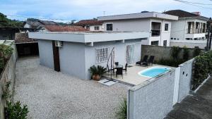 Brusque: Casa aconchegante com piscina