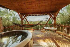 Tentes de luxe Cabane La Fontaine du Figuier : photos des chambres