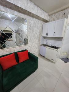 Green Pramuka by Santoso Family