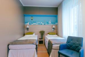Accessible twin room with access to the wellness and fitness area room in Best Western Hotel Cristal