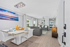 Upscale Dog Friendly and STEPS to the Beach! Spacious Modern Chic Condo!