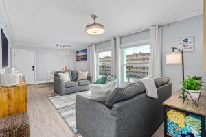 Upscale Dog Friendly and STEPS to the Beach! Spacious Modern Chic Condo!