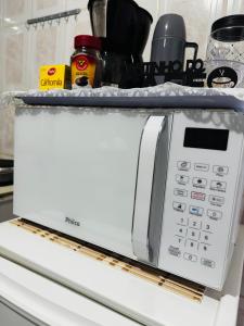 Studio aconchego em itapõa - ar cond e perto da praia