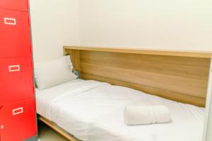 Elegant and Tidy 2BR Green Pramuka City Apartment near Mall By Travelio