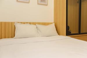 Comfort 2BR Apartment at Meikarta Apartment By Travelio