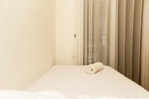 Comfort 2BR Apartment at Meikarta Apartment By Travelio