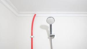 Modern and Homey 2BR at Puncak Kertajaya Apartment By Travelio