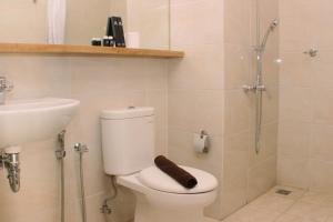 Stunning and Comfortable 1BR Apartment Mustika Golf Residence By Travelio