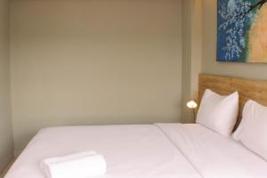 Stunning and Comfortable 1BR Apartment Mustika Golf Residence By Travelio