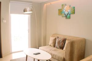 Stunning and Comfortable 1BR Apartment Mustika Golf Residence By Travelio