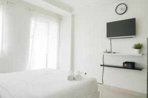 Cozy Stay Studio Signature Park Grande Apartment By Travelio