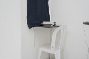 Cozy and Calm Studio No Kitchen Apartment at Aeropolis Residence By Travelio