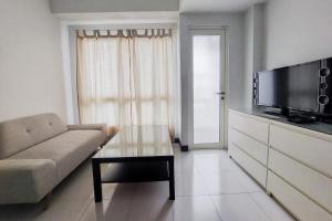 Cozy Stay Studio Apartment at Scientia Residence By Travelio