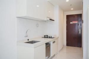 Nice and Homey Studio Room at Sky House BSD Apartment By Travelio