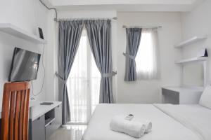 Nice and Comfy Studio Apartment at Signature Park Grande By Travelio