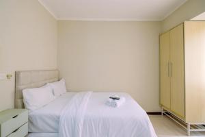 Simply Look Studio Room at Maple Park Sunter Apartment By Travelio