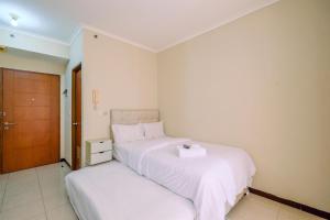 Simply Look Studio Room at Maple Park Sunter Apartment By Travelio