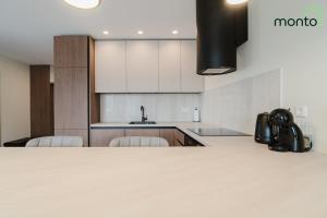 Brown apartments by Monto