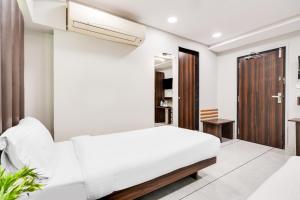 Palette by CheckIn Country Club Surat