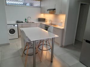 KYALANGA - SEA FACING - ground floor apartment