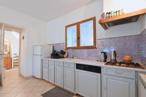 Maisons de vacances L’Ecrin du Brulat - Jardin et vue montagnes : photos des chambres