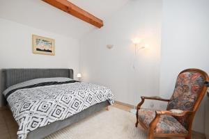 Maisons de vacances L’Ecrin du Brulat - Jardin et vue montagnes : photos des chambres