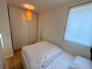 T2 en rez-de-jardin avec terrasse privative, résidence avec piscine et tennis