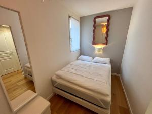 T2 en rez-de-jardin avec terrasse privative, résidence avec piscine et tennis