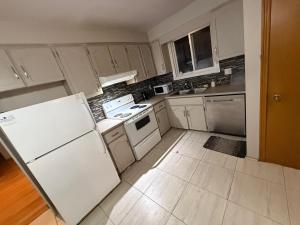 HEAVY PRICE CUT-BOOK NOW!- Next to Airport, Downtown,Transit
