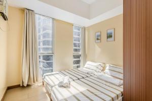 Minimalist Haven 3BR unit at Mckinley Hill