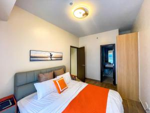 Cozy 2BR Suite near Airport & Okada, Infinity Pool