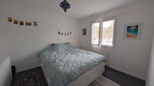 Appartements Appartement avec jardin proche de l-ocean : photos des chambres