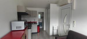 Appartements Charmant studio climatise avec parking, terrasse et piscine : photos des chambres