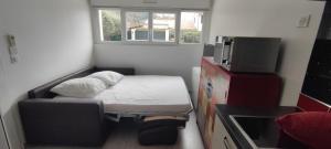 Appartements Charmant studio climatise avec parking, terrasse et piscine : photos des chambres