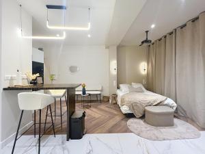 Appartements V- Appart SPA Moderne-Chic : photos des chambres