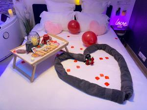 Appartements L'Escale Balneo'Romantique - Loveroom - Jacuzzi & Petit dejeuner : photos des chambres