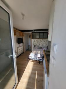 Appartements Studio Equipe La Glacerie : photos des chambres