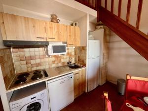 Appartements Appartement T3 avec mezzanine et parking au Rayol-Canadel - FR-1-226B-176 : photos des chambres